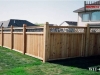 Tongue and Groove Privacy Fence With Ivy Top